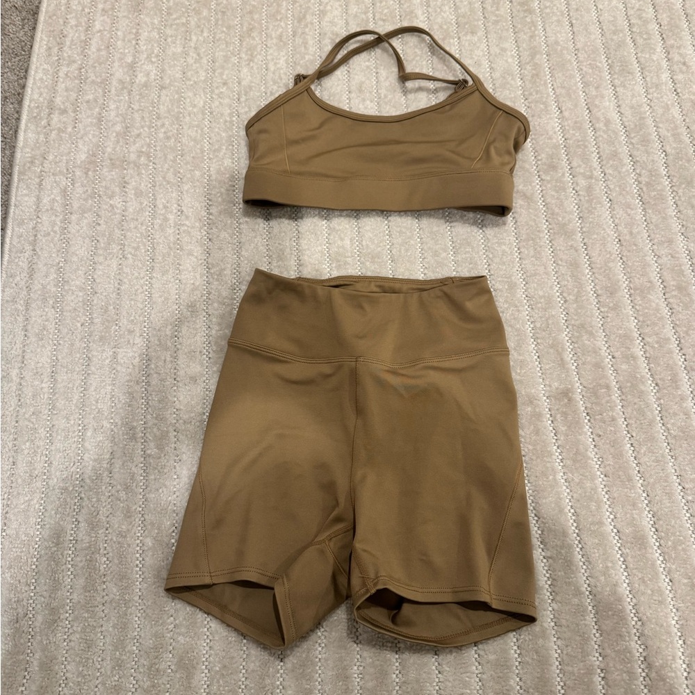 Gold/tan matching set with sports bra and high waisted biker shorts
